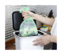 Action shot of Full Circle Fresh Air Compostable Waste Bags Lemon Scented, 25pk