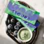 Lifestyle 1 of Floura Daily Fiber Bar Blueberry Matcha - Fruit Trimming Bars - Snacks Made From Food Scraps - High Fibre Bar